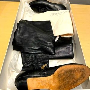 Black zip up thigh high boots